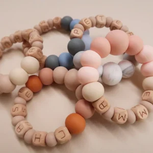 Zao_Co_teeher_teething_ring.jpgv1749307540 Anneau de dentition SOL – Bois & silicone personnalisé